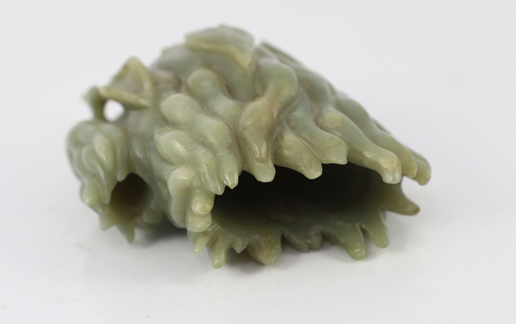 A Chinese celadon jade carving of a finger citron, 20th century